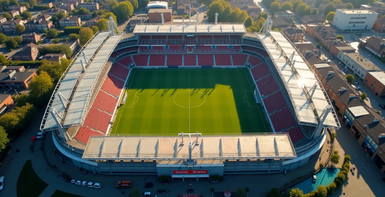 Aerial view of stadium undergoing phased renovation while maintaining partial operation